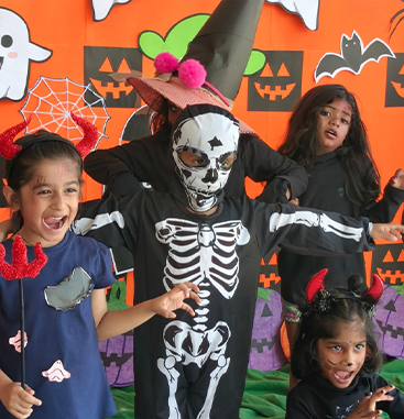 Students in Halloween costumes