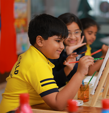 Students painting together